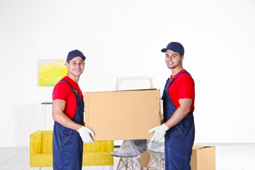 Packed office furniture and boxes ready for transport
