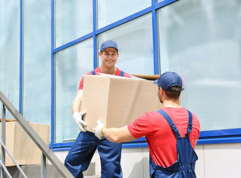 Removal van loading furniture in Shepherds Bush