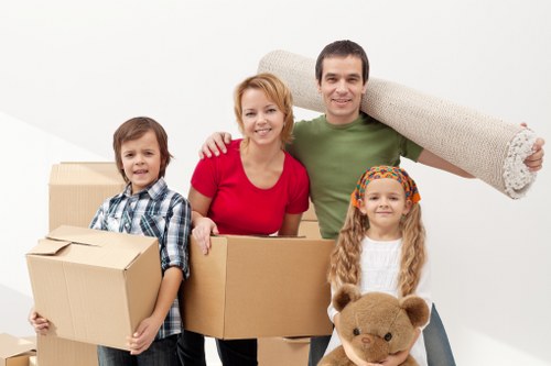 Loading furniture into a van near Shepherds Bush