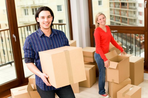Household boxes and furniture arranged for a Shepherds Bush removal van