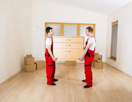Furniture and boxes being loaded for a move in Shepherds Bush