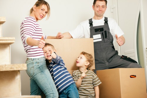Movers handling furniture during a relocation